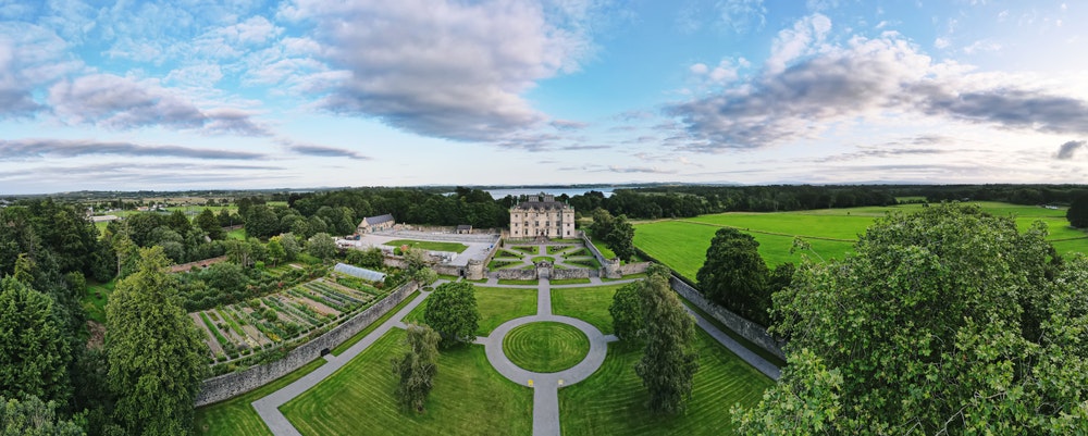 Aerial panoramic view of Portumna Castle and gardens. Beautiful location on the shores of Lough Derg on the River Shannon. Portumna, County Galway, Ireland.