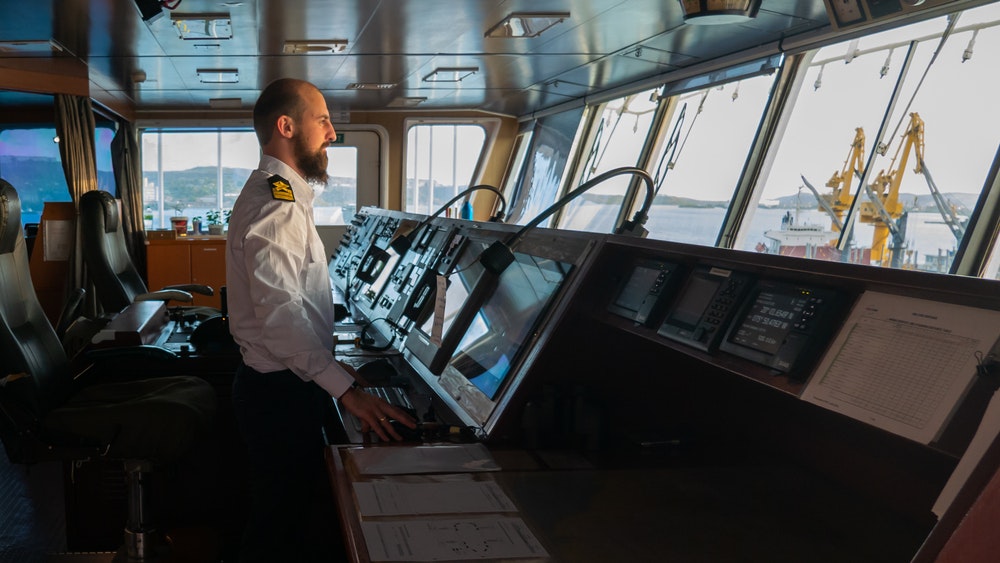 Captain standing in ship's control room