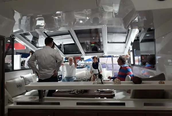 The screen between the saloon and the deck can be folded down in bad weather.