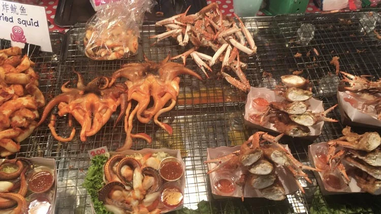 Thai street food in a market in Phuket, Thailand