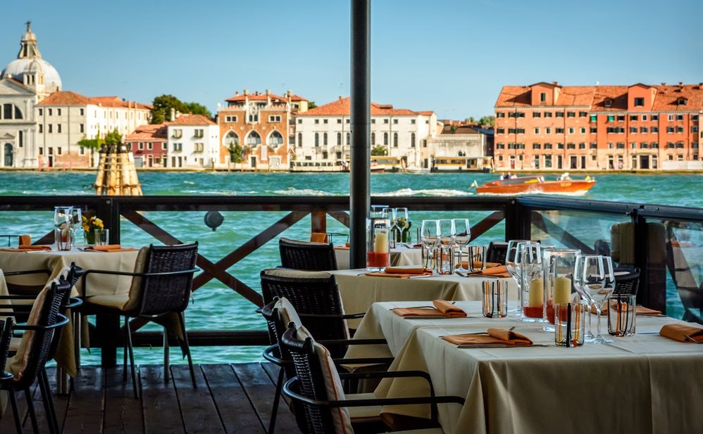 View from the restaurant on the Venetian lagoon, tables set