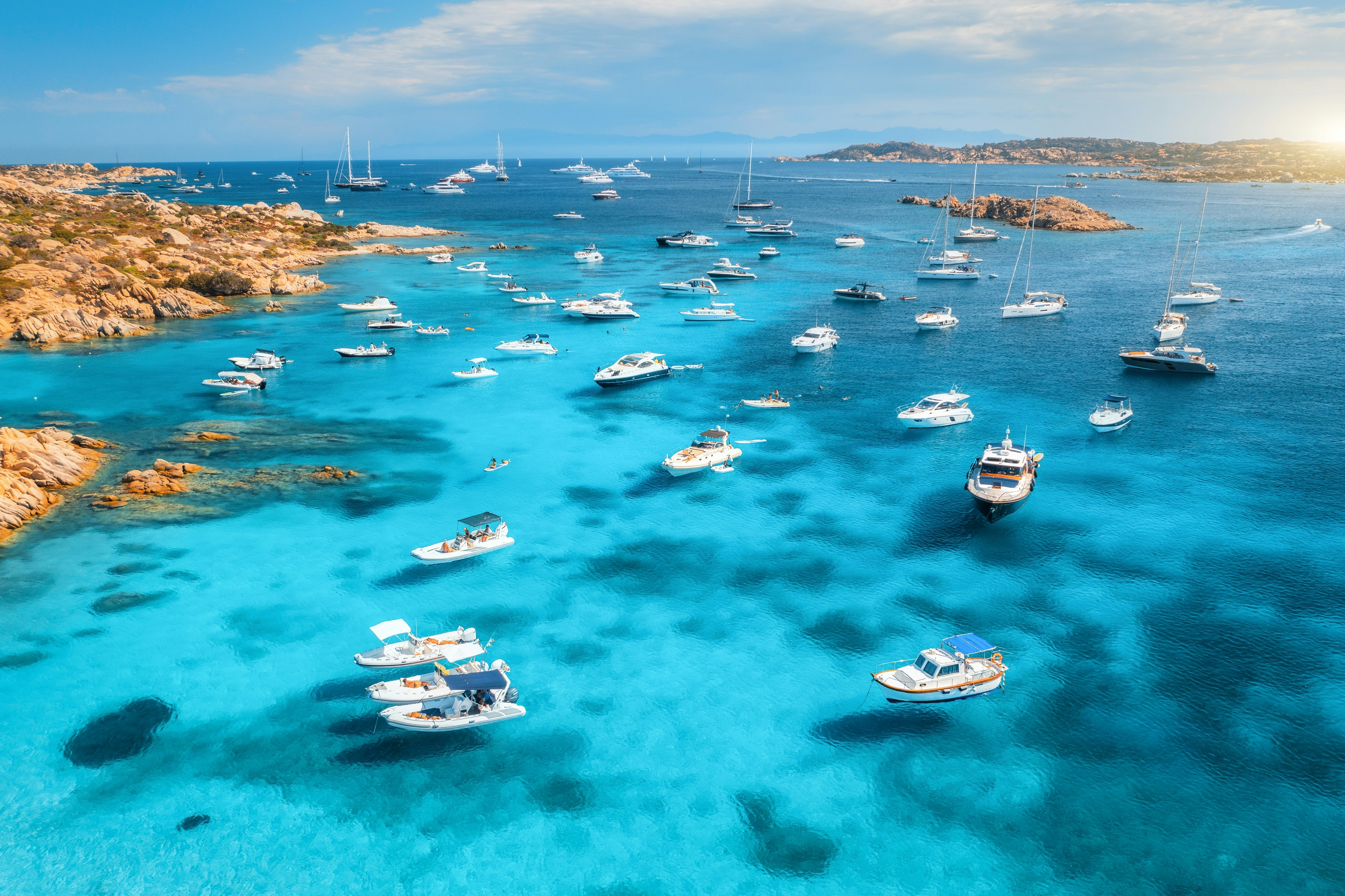 The blue sea in Sardinia attracts hundreds of yachtsmen to the area