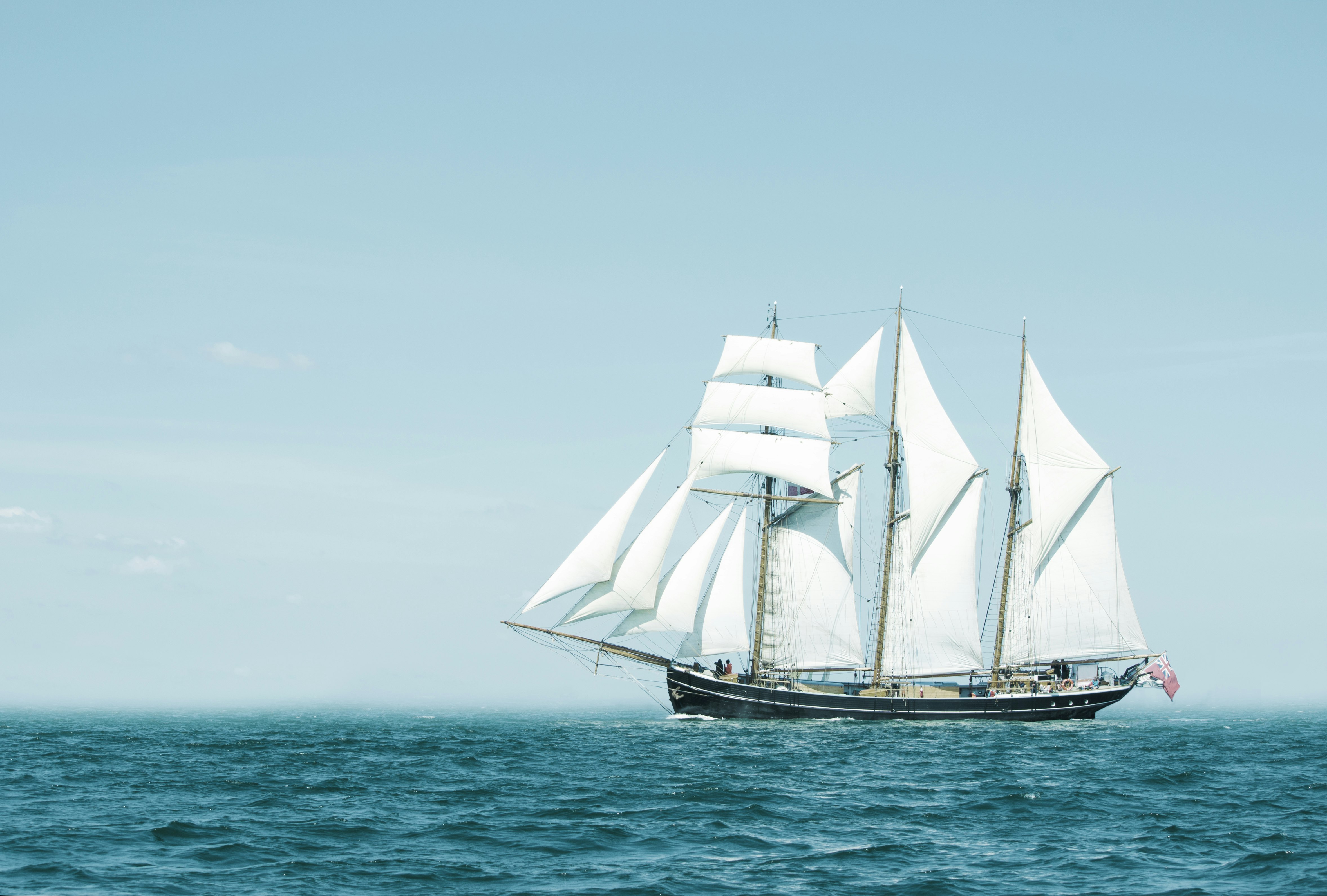 Three mast schooner under sails on the Baltic sea.